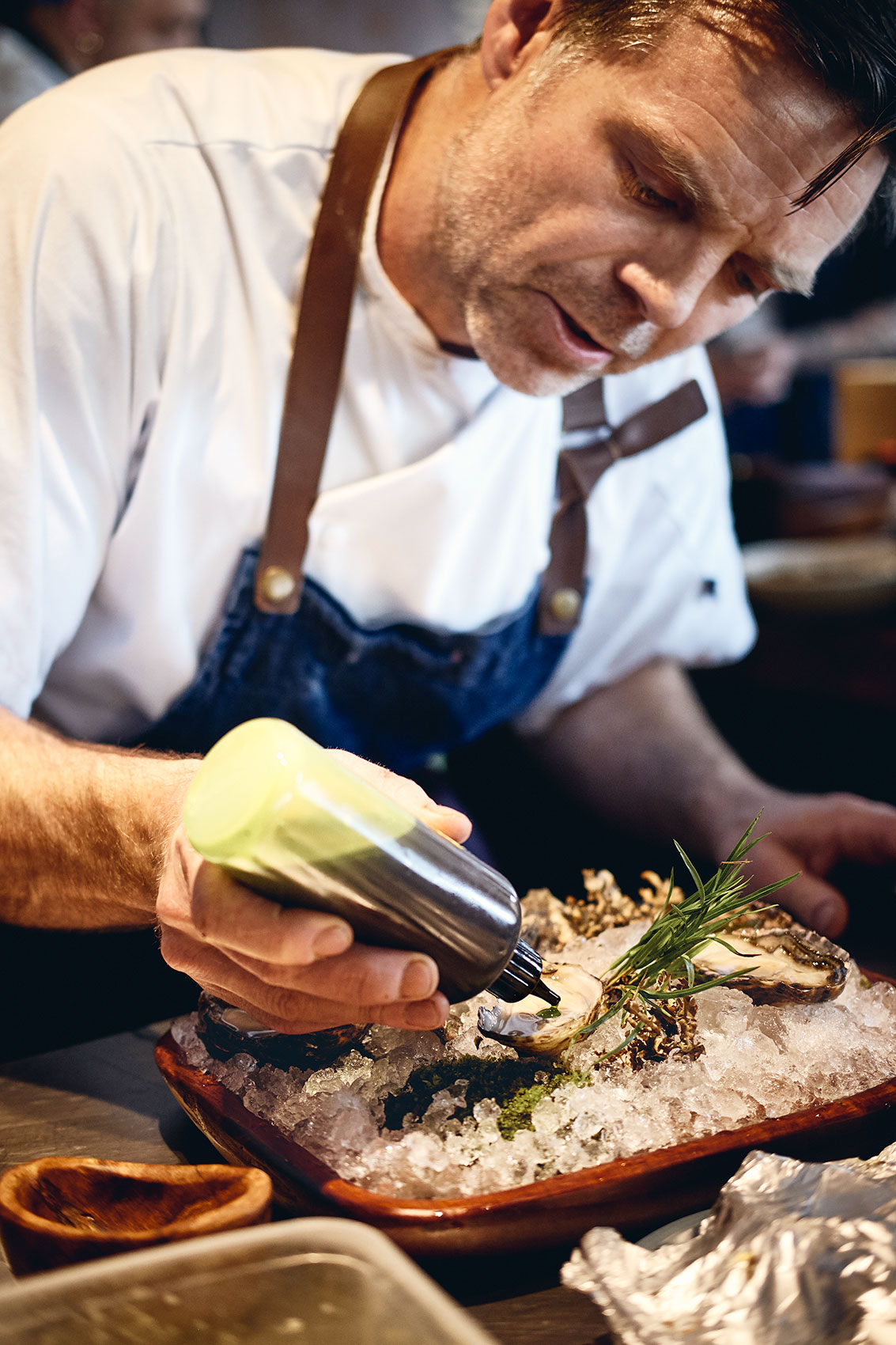 Ahi Chef Ben Bayly Dressing Oysters • Hospitality & Culinary Food Photography