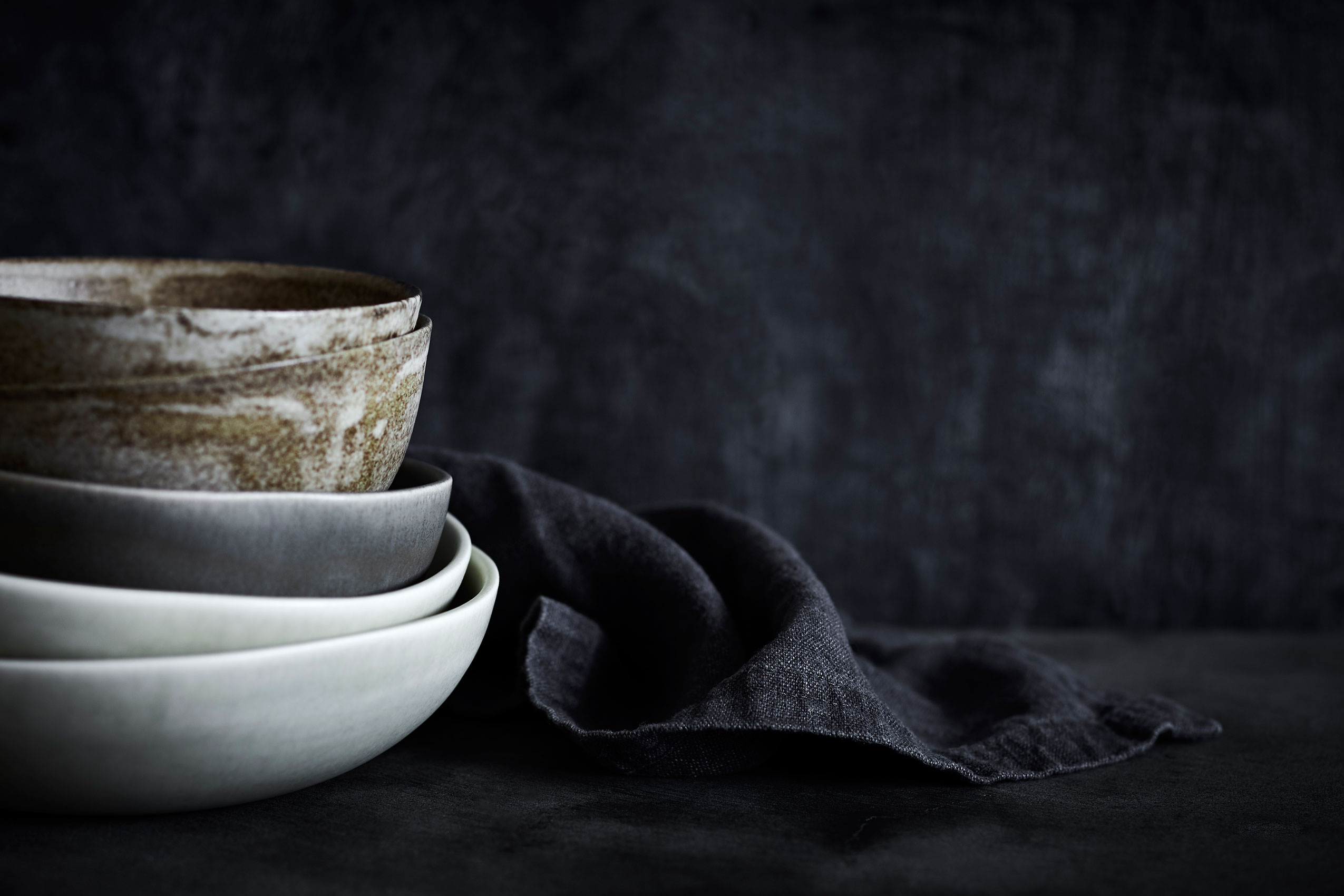 Slow Cooked • Textured Neutral Stoneware Bowls on Dark Table • Cookbook & Editorial Food Photography