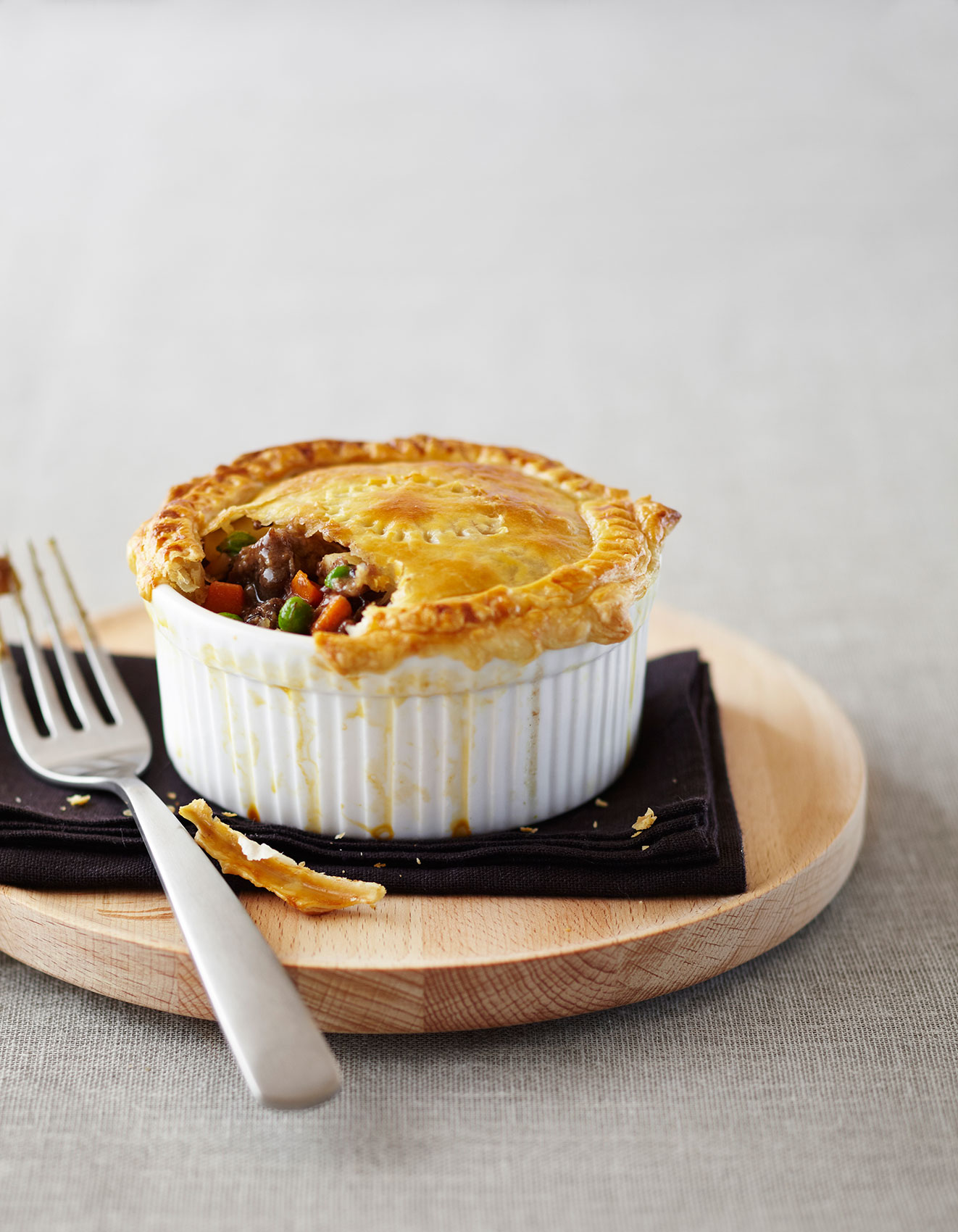 Vanilla Table • Oxtail & Vegetable Pie in White Ramekin on Wooden Board • Cookbook & EditorialVanilla Table • Dancing Chef Smoked Trout with Sprouts & Red Onions • Cookbook & Editorial Food Photography