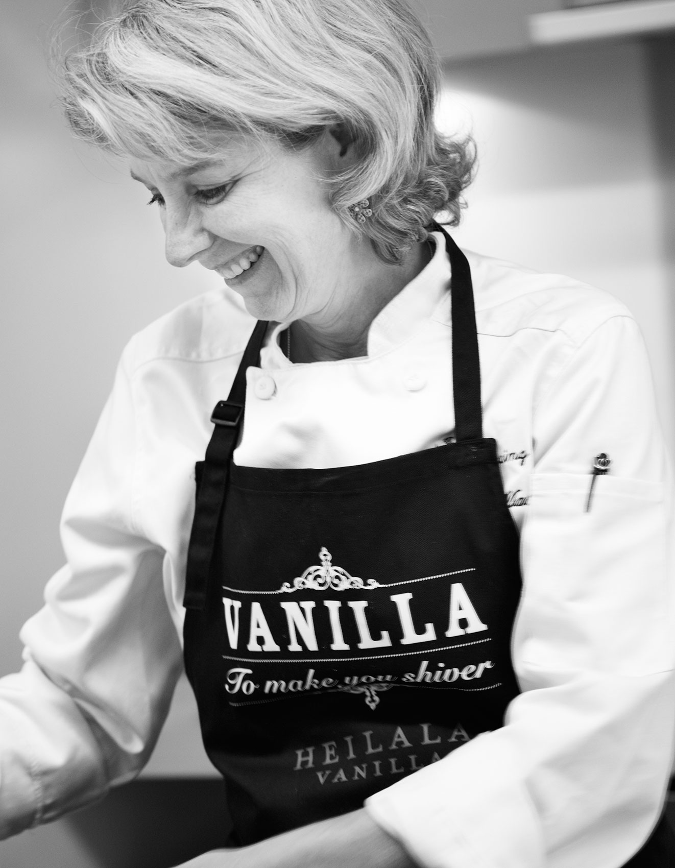 Vanilla Table • New Zealand Chef Natasha MacAller in Apron Portrait • Cookbook & EditorialVanilla Table • Dancing Chef Smoked Trout with Sprouts & Red Onions • Cookbook & Editorial Food Photography