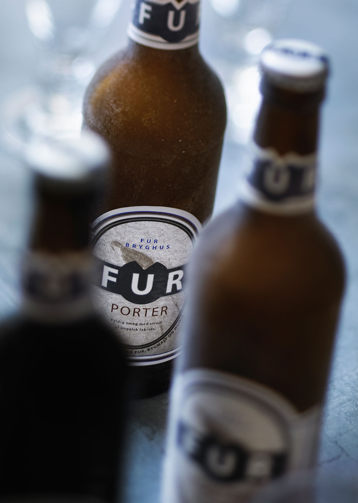 Fur Bryghus Porter Beer Bottles on Bench • Beverage & Liquid Photography