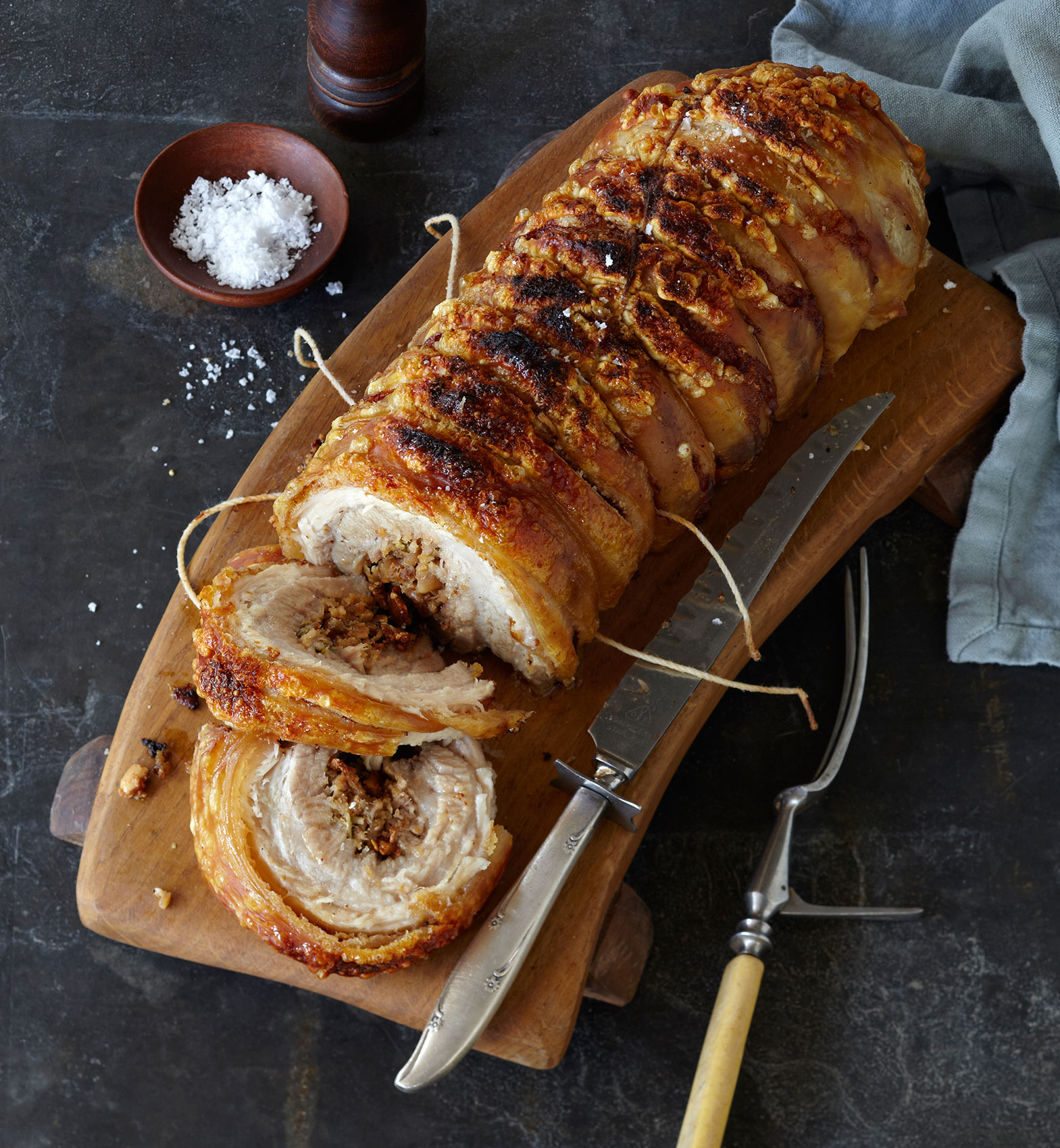 Everyday • Rolled Pork with Carving Knife & Fork on Wooden Board • Hospitality & Editorial Food Photography