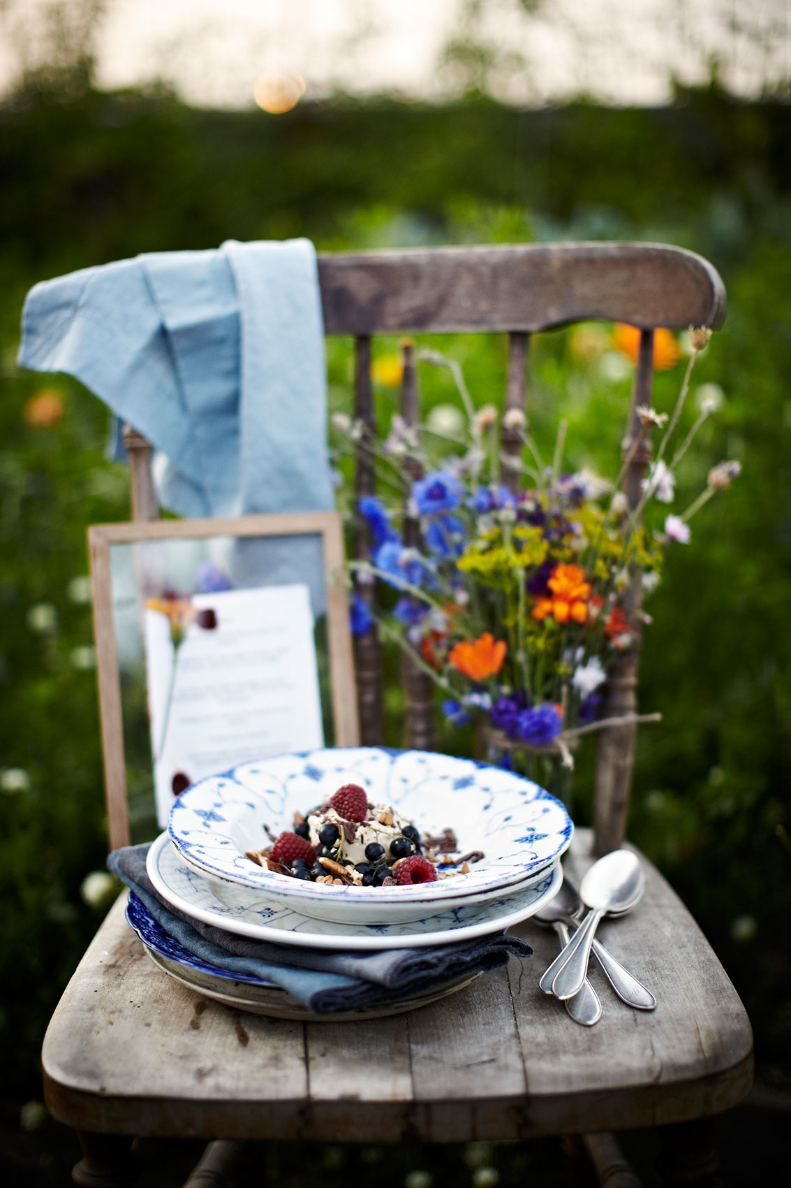 Stedsans in the Woods • Parfait with Fresh Raspberries & Blueberries on Wooden Chair • Lifestyle & Editorial Food Photography