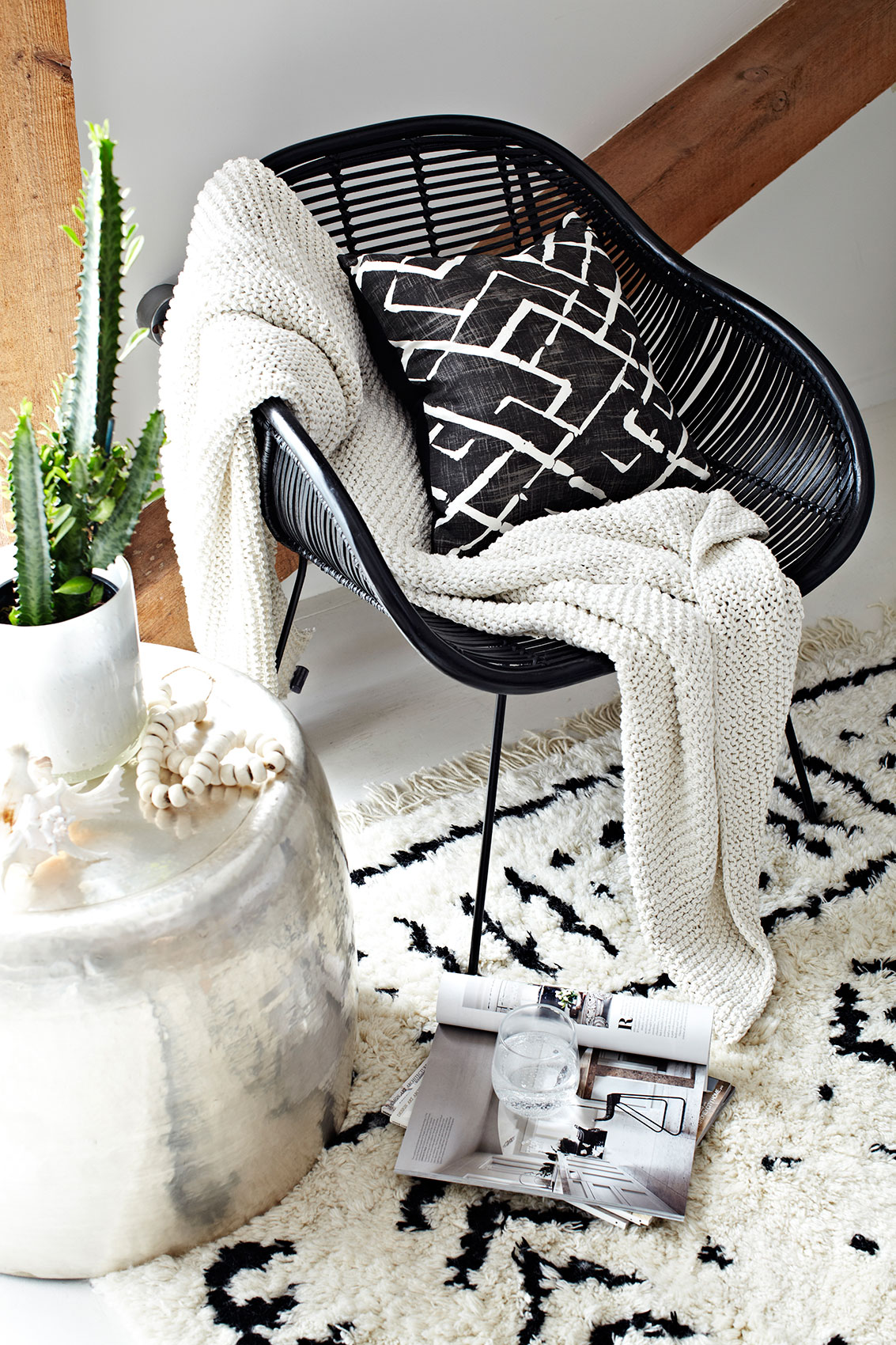 Bright Lounge Space with White Rug and Chair Throw • Architecture & Interior Photography