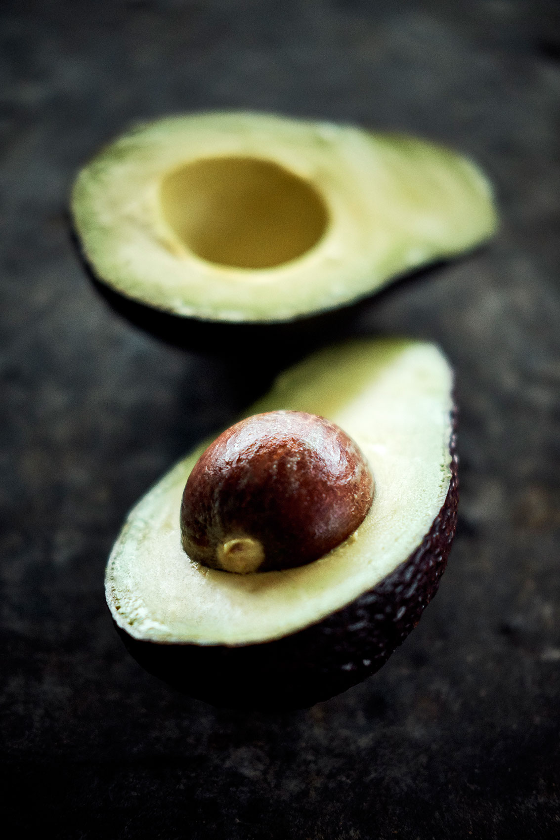 Shared Kitchen • Halved Fresh New Zealand Avocado with Seed • Lifestyle & Editorial Food Photography