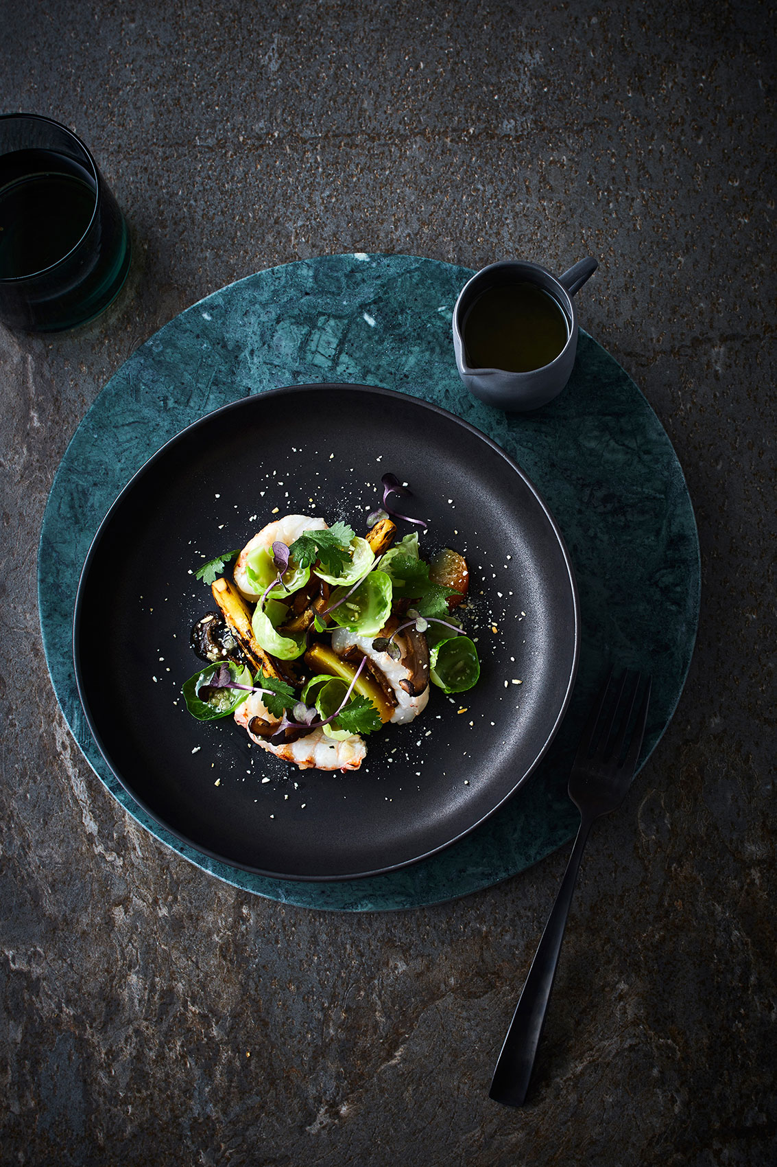 Scampi with Fresh Greens & Winter Vegetables on Dark Plate • Advertising & Editorial Food Photography