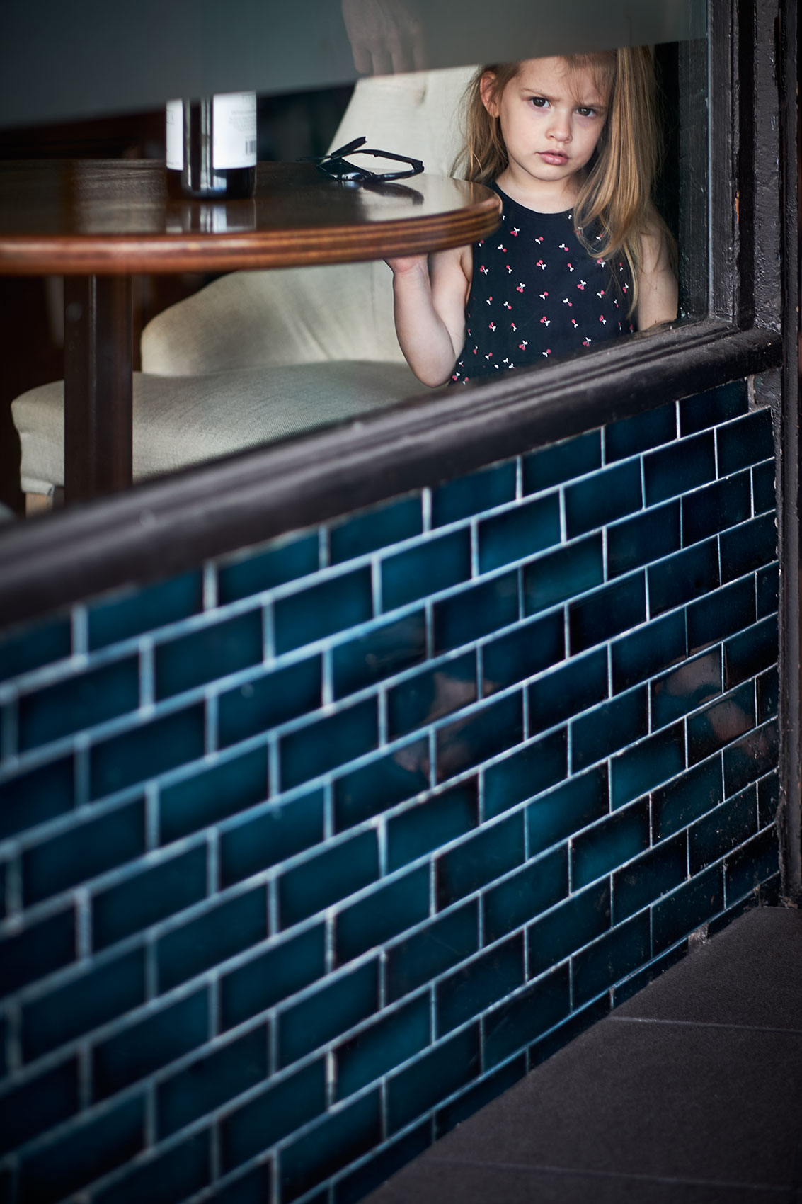 Behind Closed Doors • Girl in Restaurant Window • Lifestyle & Portrait Photography