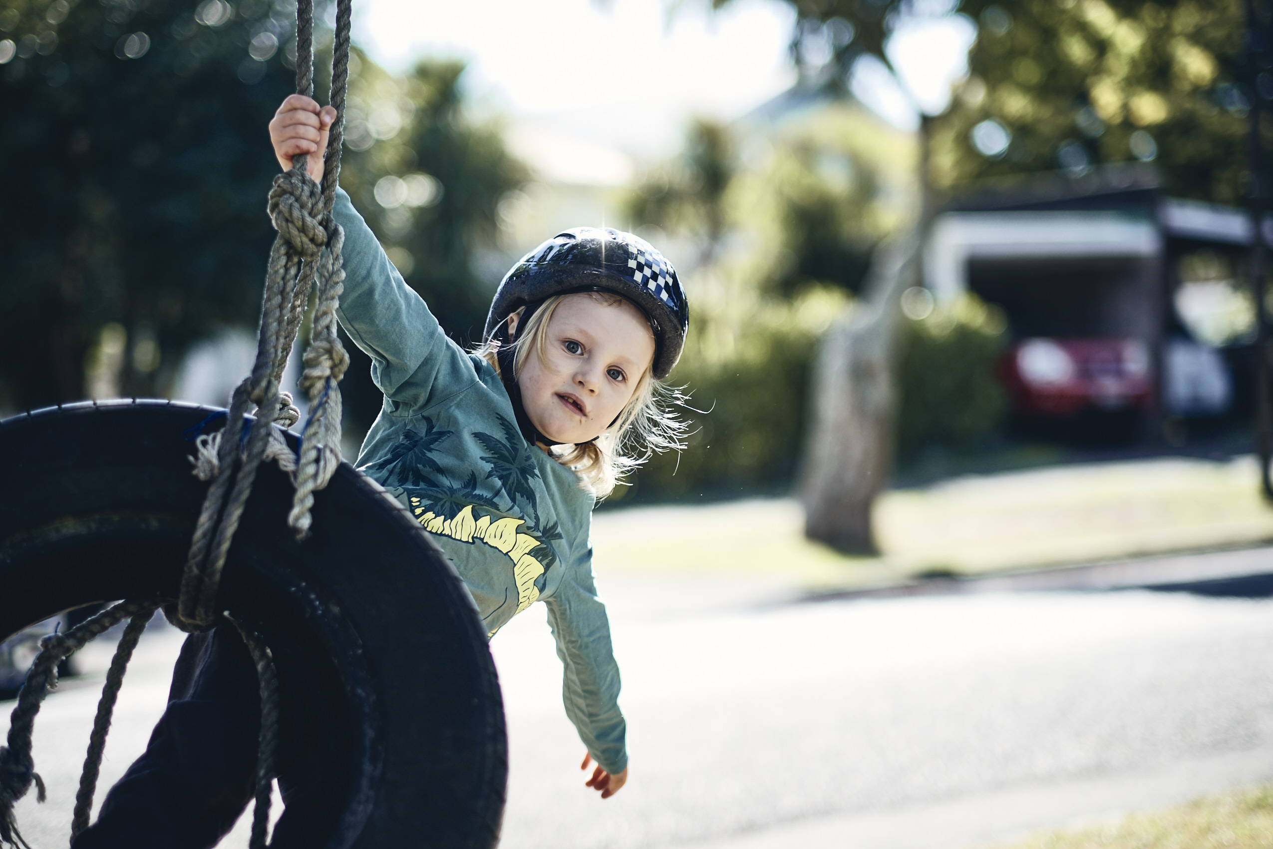 Lockdown • Young Boy Playing on Front Garden Tyre Swing • Lifestyle & Portrait Photography