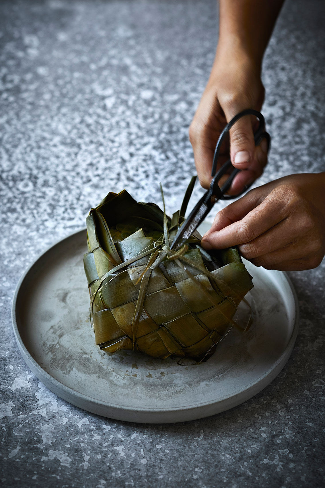 Hiakai • Cutting Open Steamed Flax Basket with Scissors • Lifestyle & Hospitality Food Photography