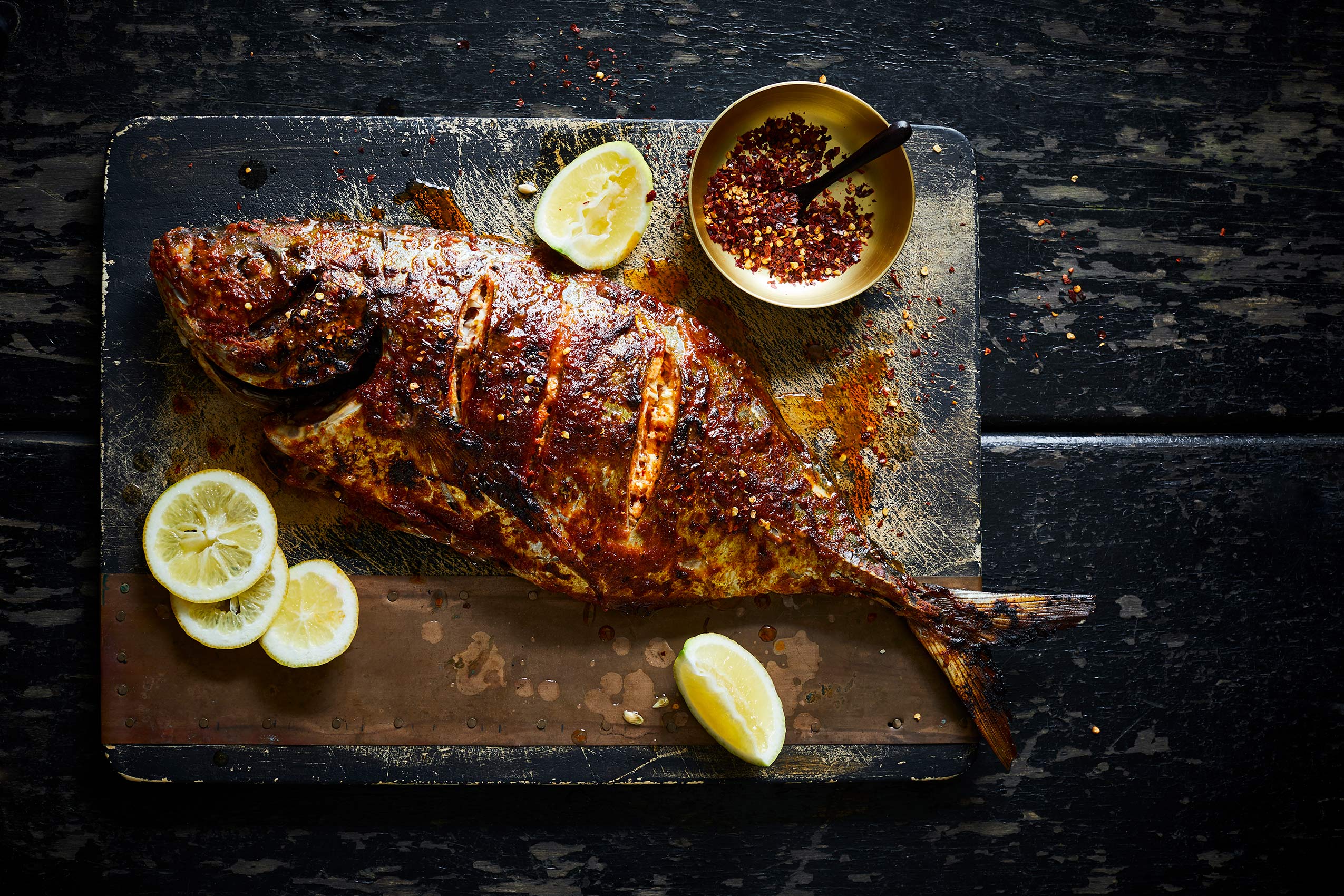 Masala Fish with Chilli & Lemon on Wooden Board • Advertising & Editorial Food Photography