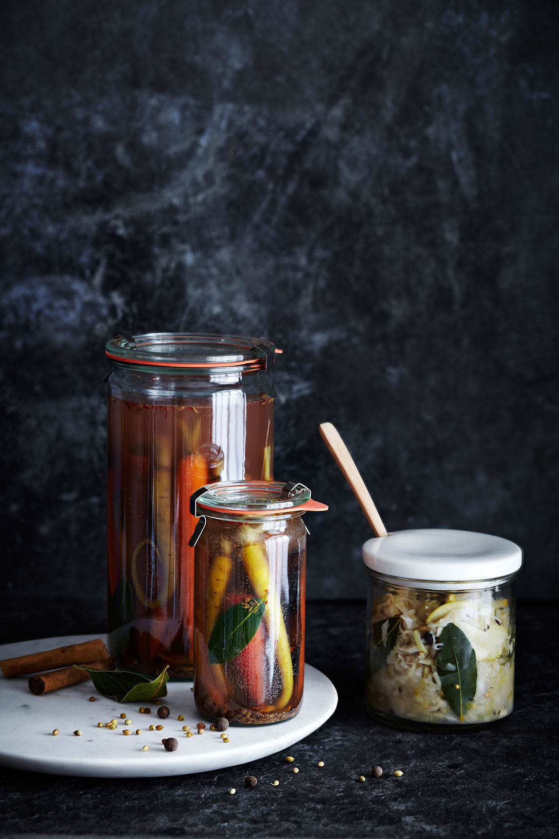 Spice Health Heroes • Fermented Carrots in Glass Jars on Marble Plate • Cookbook & Editorial Food Photography