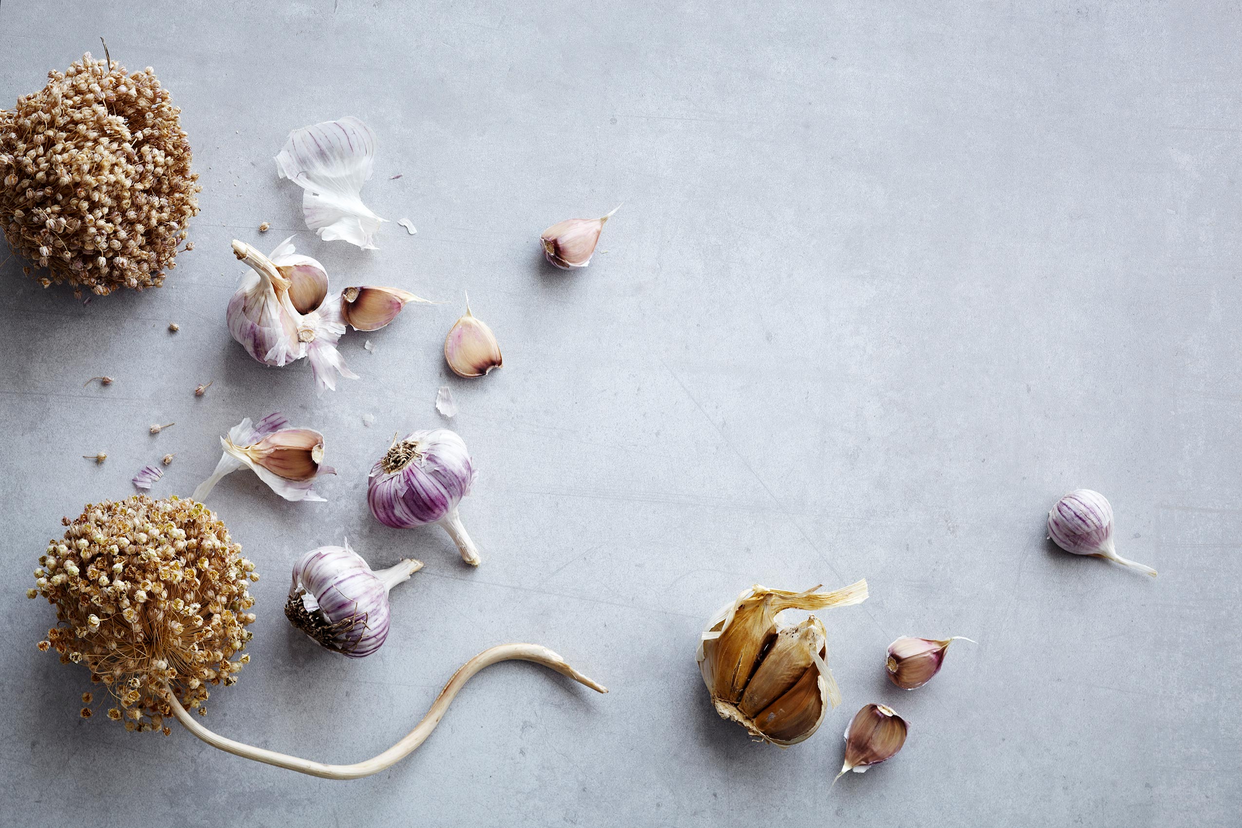 Spice Heroes • Garlic Cloves on Concrete Bench • Advertising & Editorial Food Photography