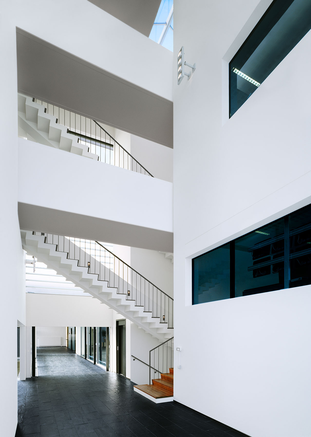 White Multi-Storey with Open Staircase • Architecture & Interior Photography